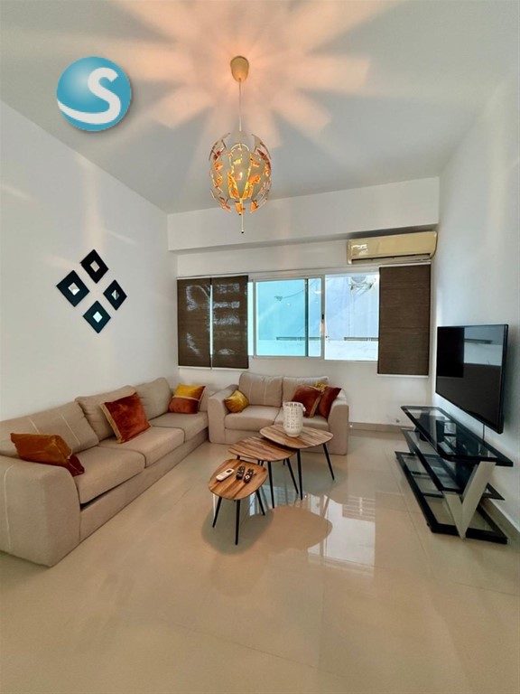 Apartamento moderno en Bella Vista con amplia terraza y parqueos en República Dominicana